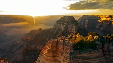 Wall Mural - Breathtaking sunset over majestic rocky formations, showcasing vibrant colors and dramatic skies. Scenic view capturing the natural beauty and grandeur of the landscape.