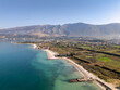 © Robin - Aerial drone view of the coastline and beach in Orikum, Albania.