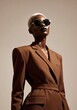 © OksKutsenko - Elegant fashion portrait highlighting bold style and pantone warm tones Pantone names its color of the year for 2025 Mocha Mousse