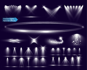 Wall Mural - set of glowing vector light effects on dark background, including spotlights, sparkles, halos, and g