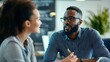 © Tee nuT - Engaging discussion between colleagues in a modern office business setting professional environment close-up view collaboration concept
