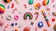 © Sumet - Colorful and Playful Arrangement of Various Decorative Objects on a Soft Pink Background Celebrating Diversity and Joy