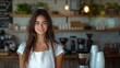 © kodidesign - Friendly Female Barista Smiling in Cozy Coffee Shop with Rustic Decor