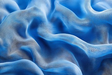 Close-up of blue mesh fabric, with waves and folds, against a vibrant blue background. 