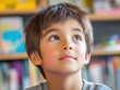 © Aashutosh Pandit - thoughtful child looking up in a classroom