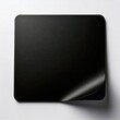 © Eky Epsa - Black square sticker with peeled corner.