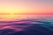 © projek - A serene ocean sunset with gentle waves and a colorful sky.