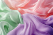 © wolfhound911 - An abstract digital background of smooth, flowing color transitions in pastel pink, purple, and green.