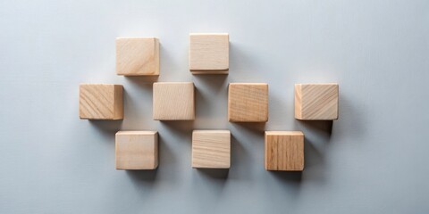 Aufkleber - A Pattern of Unfinished Wooden Blocks Arranged in a Diagonal Formation on a Light Gray Background