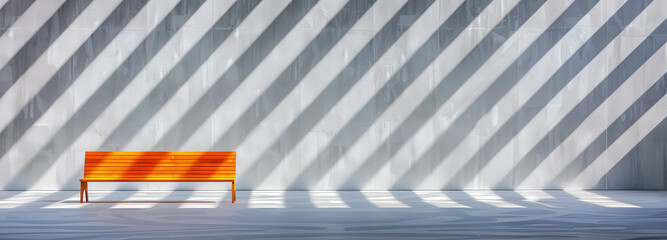 Wall Mural - Bright orange bench under striking shadow patterns indoors