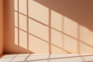 Poster - Warm beige background with window shadow creating a minimalist and serene atmosphere