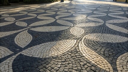 Aufkleber - Cobblestone pathway with a geometric pattern of interlocking circles and leaves, creating a visually appealing and intricate design.