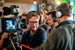 © Degimages - Director wearing headphones, watching monitors with crew, capturing a dramatic close-up shot