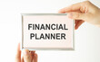 © Pawel - A card with text FINANCIAL PLANNER, business concept image with soft focus background
