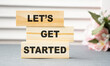© Pawel - let's get started text on wooden block, business concept