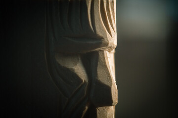 carved face made of wood