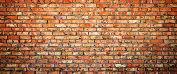 Wall Mural - grunge brick wall background with copy space, old brickwork surface