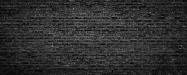 Wall Mural - dark brick wall, black masonry of a burnt building