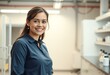 © iushakovsky - A smiling female engineer in a modern laboratory