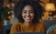 © typepng - A mixed-race African American adult student, wearing earphones, participates in a virtual meeting with friends and an educational webinar, chatting from a home office. They are on a video e-learning