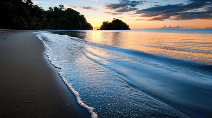 Wall Mural - A beautiful beach with a calm ocean and a beautiful sunset