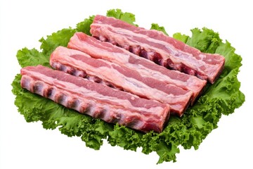 Poster - Fresh pork ribs arranged on a bed of lettuce, ready for cooking or grilling.