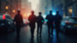 © Dmytriy - Blurred silhouettes of police officers on a dark street with bright city lights and bokeh effect