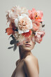 © juniorideia - A woman from shoulders up, her face adorned with exquisite flowers