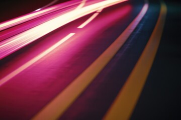 A blurred image of a car moving along a city street