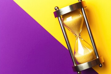 An hourglass on a colorful background