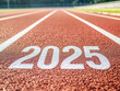 © Myimages - Number 2025 on road. Home stretch for end of 2024. Runners track background. New year banner with number 2025. Motivational background. Starting line for early 2025. New year approach concept