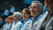 © aicandy - A diverse group of professionals in medical attire gathered attentively at a conference, showcasing dedication and engagement in a collaborative learning environment