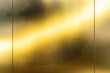© Daniel - Abstract texture background, light shining on golden stainless wall