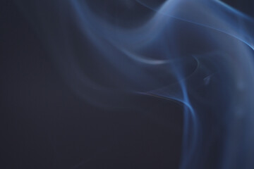 Wall Mural - close up of incense smoke as background. smoke is the gaseous products of burning materials especial
