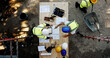 © peopleimages.com - Blueprint, construction and men at table with planning, collaboration and site inspection paperwork from above. Architect, building team and contractor with layout, pointing and project management