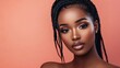 © Surachetsh - On a pink backdrop, Black women with elegant braids and glowing skin shine, making this image perfect for luxury skincare promotions.