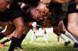 © peopleimages.com - Rugby, team and men in scrum for strength training, practice or exercise for match and game on field. Fitness, performance and athletes with tackle for warm up, competition and workout for tournament
