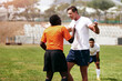 © peopleimages.com - Argue, disagreement or discipline with rugby player and referee on sports field for communication or decision. Dispute, frustration and mistake with official talking to man for competition or game