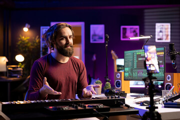Poster - Producer doing online paid classes to help people play piano, teaching lessons from his home studio and recording tutorial. Skilled instructor playing midi controller synthesizer, explaining notes.