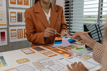 Wall Mural - the development team is consulting on the design of the website ux ui, they are working on project o