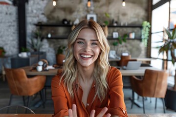 Wall Mural - Blonde woman smiling at desk with business concept.