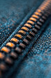 © VGX Ultra - Macro Photography of Zipper on Blue Denim Highlighting Texture and Industrial Design Aesthetic