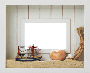 Wall Mural - Seaside vacation conceptual background. Rustic white picture frame decorated with souvenirs - shrimper or fishing boat, sand, sea snail, rope