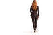 © VisualProduction - Business woman in business black suit walking away on white background