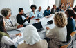 © Jacob Lund - Multiethnic group of businesspeople brainstorming and strategizing in a meeting