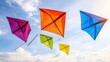 © AFFANYUDA - Colorful kites flying in a bright blue sky.