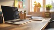 © thesweetsheep - Modern workspace with a laptop, stationery, and plants, illuminated by warm sunlight.