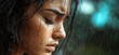 © k_viktar - Woman in rain with droplets on face, emotional expression, close-up portrait, wet hair, soft focus background, copy space for text