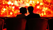 © Taras Vykhopen - Couple enjoying an intimate moment in a movie theater with a glowing screen