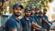 © PixelHarbor_PRODM - A group of Indian young men focused on professional cleaning services, with ample copyspace for text.